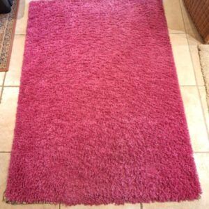 2 tapis roses identiques