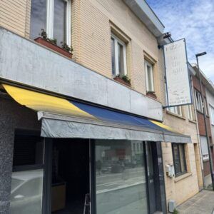 Marquise - reclame pour magasin - protection solaire